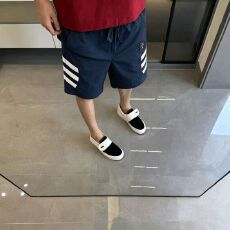 批发2026<b class='q'>夏</b>季短裤男士撞色新款拼接条纹休闲裤宽松松紧腰皮织带潮短裤