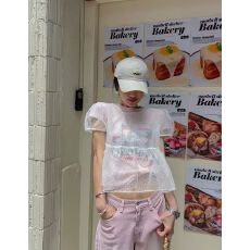 批发<b class='q'>韩国</b>设计感透视叠穿波点衬衫女夏季新款小众个性宽松荷叶边上衣