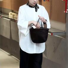 批发高级感早春新款宽松长袖白色圆领衬衫法式女装2026轻奢扣别致上衣