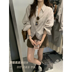 批发hellokay<b class='q'>设计</b>感松弛V领蕾丝拼接衬衫秋季百搭V领上衣女