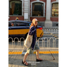 批发'早春新宠'手工编织钩花棉线慵懒感镂空水桶包度假风腋下单肩包