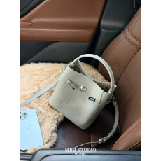 批发头层牛皮春夏新品凯莉水桶包荔枝纹百搭斜挎手提包配肩带,收纳包