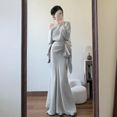 批发法式气质斜肩长袖连衣裙子女秋冬季2025新款修身包臀鱼尾长裙套装