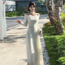 批发法式一字肩白色针织<b class='q'>连衣裙</b>子女2025新款秋冬季白月光气质收腰长裙