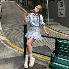 批发春季穿搭蓝色长袖<b class='q'>条纹</b>衬衫连衣裙子女2026新款高级感收腰百褶短裙