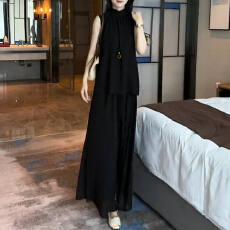 批发法式高级感黑色挂脖<b class='q'>连衣裙</b>子<b class='q'>女</b>夏2026新款度假风宽松休闲长裙套装