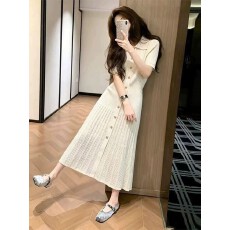 批发法式高级感米杏色翻领连衣裙女2026夏新款气质<b class='q'>通勤</b>单排扣a字长裙
