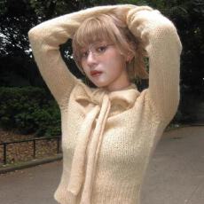 批发2025秋冬新款慵懒风软糯蝴蝶结饰提花图案镂空通勤<b class='q'>可爱</b>针织衫毛衣