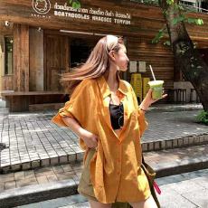 批发橘色显白<b class='q'>衬衫</b>女夏季款宽松开衫外套<b class='q'>衬衣</b>上衣翻领长袖防晒设计外套