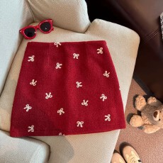 批发新年红色蝴蝶结毛呢半身裙女秋冬加厚甜美小个子包臀显瘦A字短裙