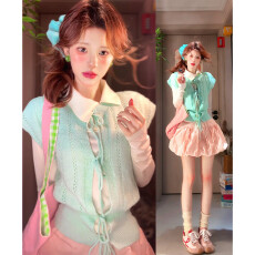 批发早春穿搭2026新款绿色针织马甲叠穿打底衫女夏巨好看花苞短裙套装