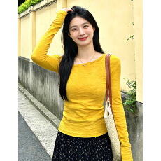 批发韩系巨好看ootd穿搭一整套早春2026新款黄色斜肩t恤女半身裙套装