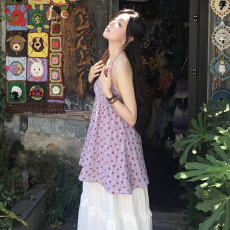 批发紫色挂脖碎花连衣裙子女夏2026新款法式海边度假绝美露背吊带短裙