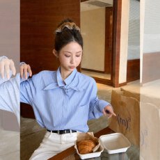 批发浅蓝色<b class='q'>衬衣</b><b class='q'>衬衫</b>早秋装女款2026新款早秋穿搭显瘦慵懒超火减龄上衣