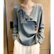批发法式复古不规则<b class='q'>牛仔</b><b class='q'>衬衫</b>女早秋新款气质独特斜襟排扣系带显瘦上衣