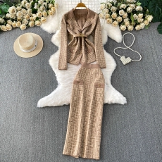 批发时尚女神范气质金属系扣收腰显瘦西装领外套高腰中长裙针织两件套