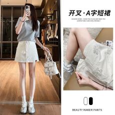 批发INS减龄小<b class='q'>清新</b>白色牛仔短裙2026夏季新款洋气时尚A字防走光半身裙