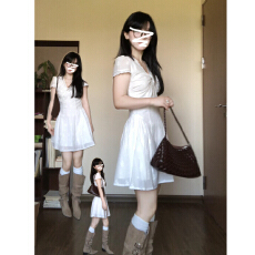 批发法式蕾丝拼接白色v领扭结<b class='q'>连衣裙</b>子女夏季2026新款小个子收腰短裙