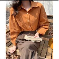 批发2026春秋季新款橘色纯棉休闲宽松衬衫女法式温柔风百搭叠穿上衣