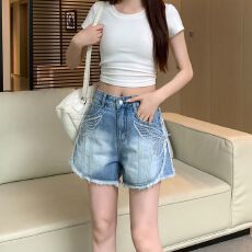 批发美式复古怀旧夏季新款刺绣毛边牛仔短裤女