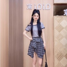 批发2026半身裙女夏季新款美式复古格子不规则设计感短裙