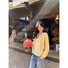 批发黄色花边绞花宽松<b class='q'>针织</b><b class='q'>开衫</b>女2026早春季多巴胺甜美减龄浪漫风上衣