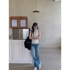批发韩系纯欲辣妹风设计感交叉v领无袖挂脖式背心少女V领纽扣装饰上衣