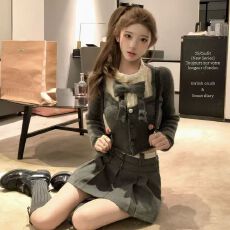 批发韩版学院风<b class='q'>时尚</b>套装秋冬新款设计感蝴蝶结气质针织衫百褶裙两件套