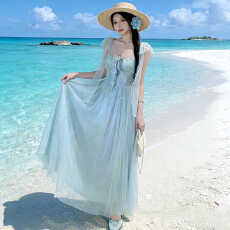 批发绿野仙踪 绿色网纱吊带连衣裙女2026新款海边度假氛围感气质长裙