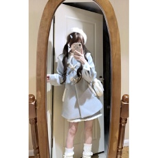 批发学院风奶蓝色娃娃领斗篷毛呢外套女秋冬高级感中长款加厚呢子大衣
