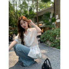 批发甜美风白色翻领泡泡袖<b class='q'>衬衫女</b>夏季设计新款简约单排扣百搭上衣