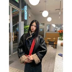 批发黑色毛绒拼接<b class='q'>皮衣</b>女2025冬季新款韩版宽松夹棉防风短外套