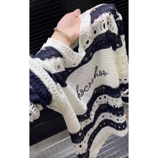 官图 小众潮流高级感镂空长袖针织衫女2026春季新款简约圆领上衣