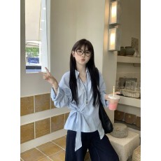 蓝色不规则绑带长袖衬衫女春季韩系设计感收腰别致气质上衣