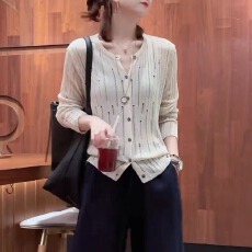 批发冰丝防晒针织开衫薄款女夏季2025新款宽松设计感时髦镂空罩衫上衣