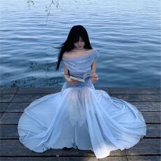 批发性感纯欲蓝色网纱拖尾斜肩连衣裙女2026新款度假掐腰鱼尾包臀<b class='q'>长</b><b class='q'>裙</b>