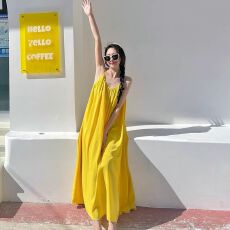 批发海边度假性感露背吊带连衣裙女夏季新款宽松a字裙温柔黄色<b class='q'>长</b><b class='q'>裙子</b>