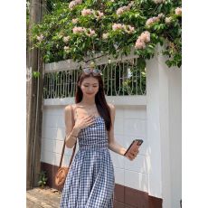 格子抹胸裙一字肩连衣裙女夏季法式气质设计感收腰海边度假长裙子