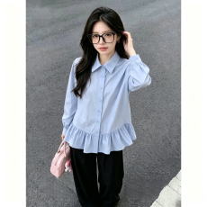 批发韩系通勤翻领裙摆<b class='q'>衬衫</b>女秋季气质<b class='q'>衬衣</b>设计感小众长袖蓝色翻领上衣