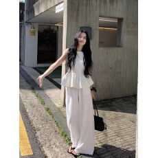 批发外穿不规则<b class='q'>显瘦</b>甜辣风荷叶边别致无袖上衣2026夏季新款阔腿裤套装