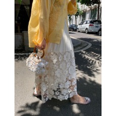 批发设计感蕾丝拼接镂空钩花a字半身裙2026新款白色松紧腰大摆中长裙