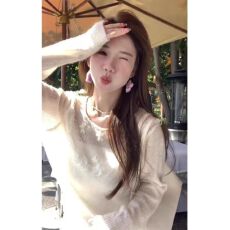 批发温柔风蕾丝拼接绣花针织衫女2025春季新款设计感宽松休闲罩衫上衣