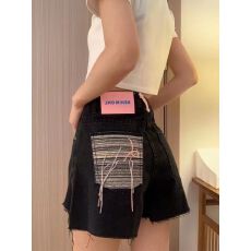 批发美式设计感阔腿裤子夏季新款高腰<b class='q'>热裤</b>复古毛边破洞黑色牛仔短裤女