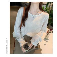 批发白色冰丝针织防晒罩衫女夏2026新款薄款宽松配吊带的圆领长袖上衣