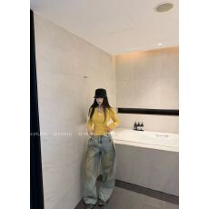 批发十三行复古泥黄脏染牛仔裤女2026春褶皱直筒阔腿长裤子