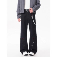 黑色斜切纽扣孔刺绣牛仔裤时尚百搭修身显瘦潮流个性舒适百搭长裤