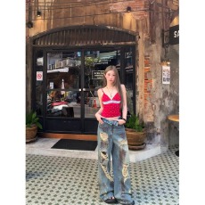 批发美式复古乞丐破洞牛仔裤男女款2026夏季流行单品潮牌宽松阔腿裤子