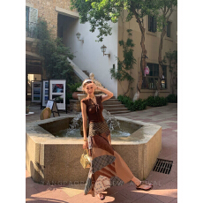 批发废土风复古格纹拼色半身裙女民族风新款设计感中长款显瘦A字裙子