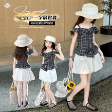 批发<b class='q'>女</b><b class='q'>童</b>夏季新款度假风格子吊带套装2026年中大童短裙轻薄蛋糕裙显瘦