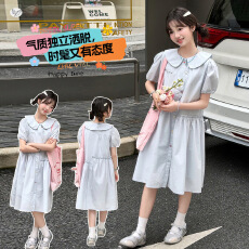 批发女童娃娃领连衣裙2026夏季新款中大童学院风衬衫裙宽松彩扣中长裙